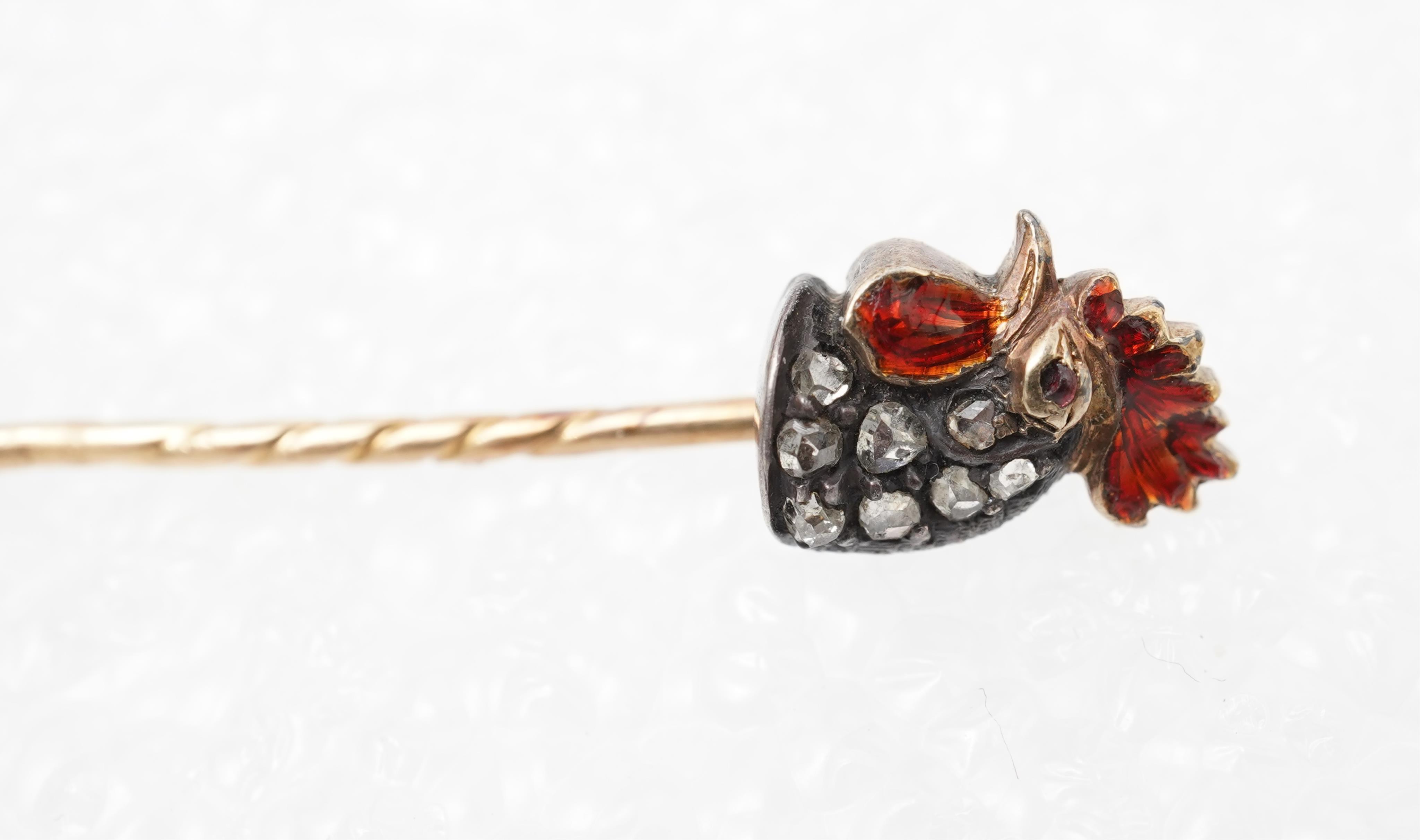 An enamel and diamond stick pin, circa 1900